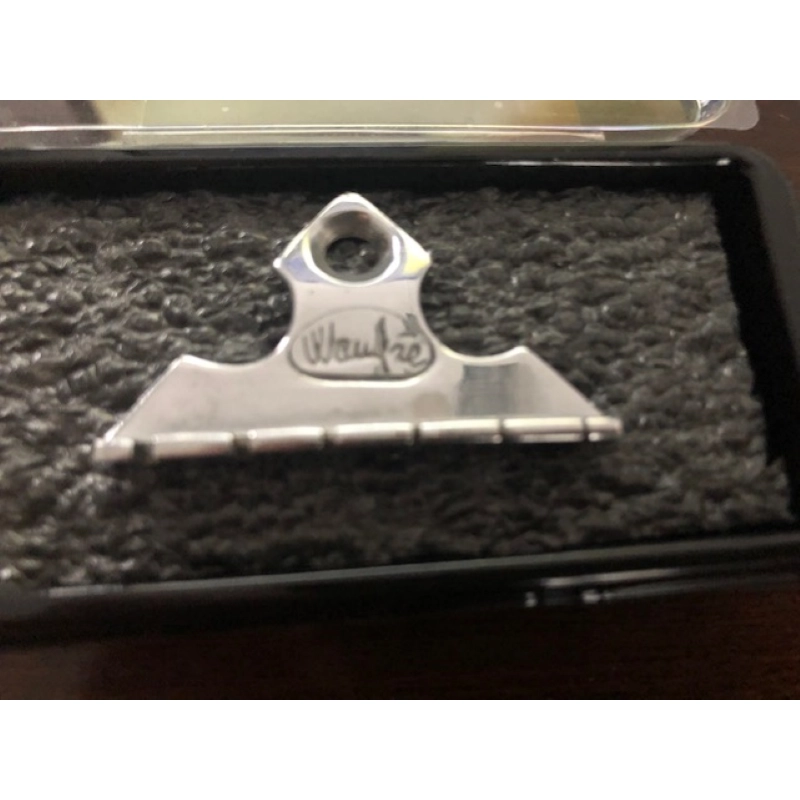 Allparts WANDRE' ORIGINAL CHROME GUITAR NUT available 1 pc only